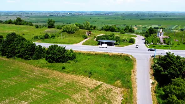 Aerial drone view of a flying over the rural agricultural landscape.