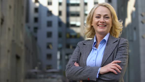 Smiling Senior Manager in Business Suit Looking in Camera, Career Motivation