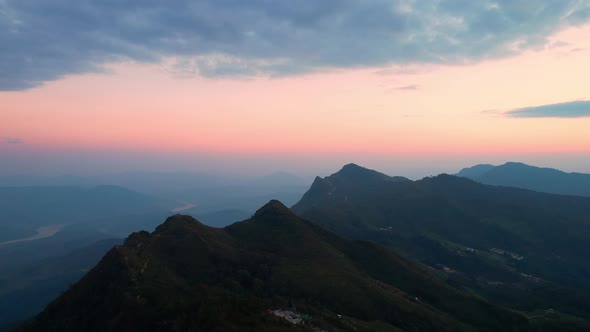4K Aerial view over the mountains at sunset. Drone Flight Footage
