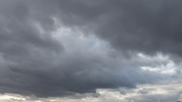 View of beautiful stormy sky with clouds.