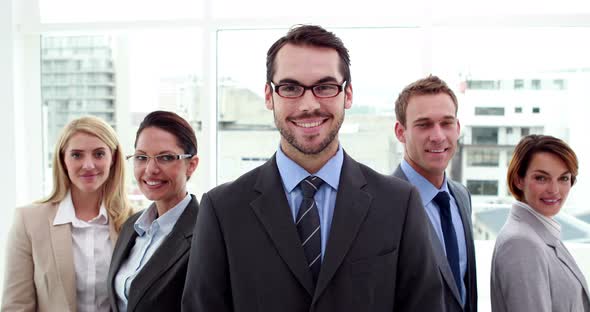 Smiling Business Team Posing for Camera