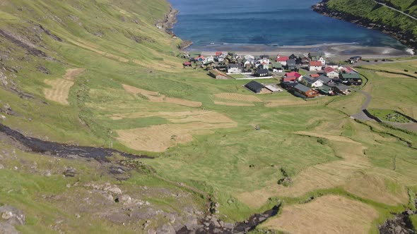 Aerial Revealing Shot of Village in Faroe Islands By the Sea