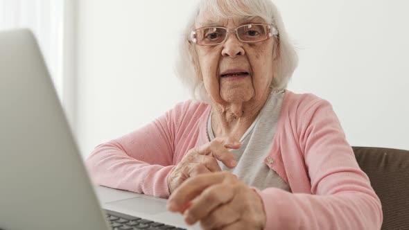 Senior Woman with Laptop