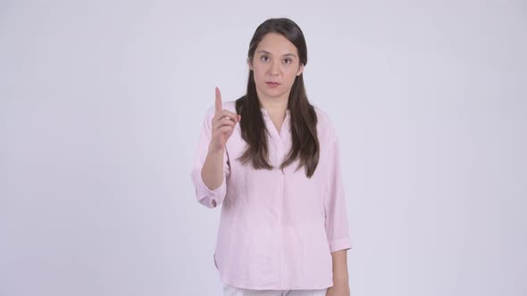 Young Beautiful Multi-ethnic Businesswoman Pointing Up