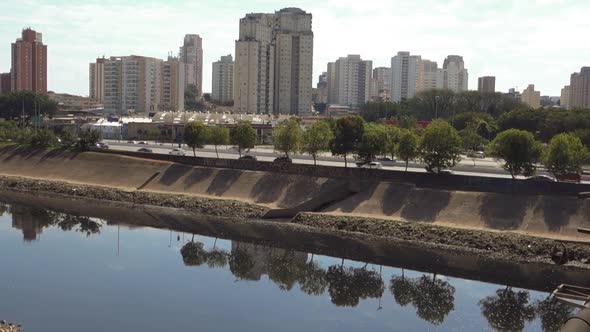 Tiete river runs through the city of Sao Paulo, Brazil. marginal Tiete highway on the back