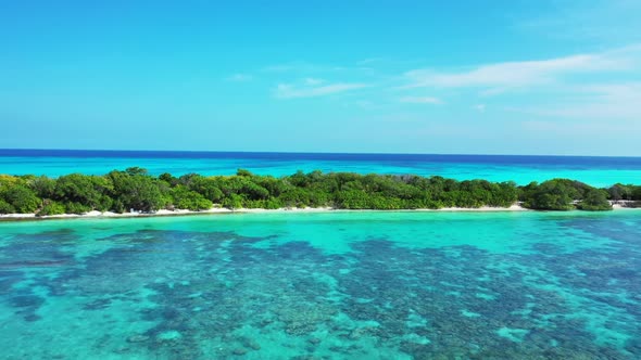 Aerial drone view sky of relaxing tourist beach lifestyle by blue lagoon with clean sand background 