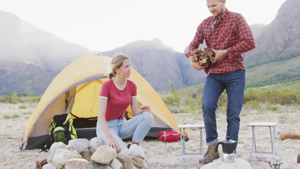 Caucasian couple camping in nature