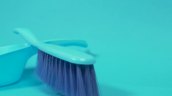A Hardpile Dust Brush and a Blue Dustpan