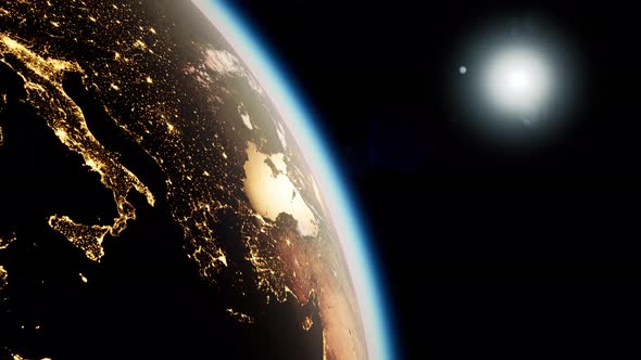 Space, Sun and Planet Earth at Night alt