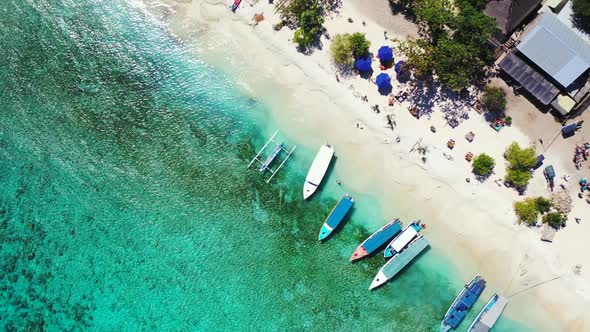 Aerial abstract of perfect coastline beach vacation by blue lagoon with white sand background of a d