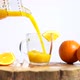 Pouring orange juice into glass - VideoHive Item for Sale