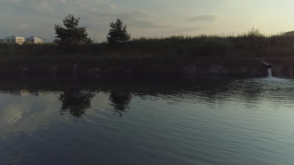 Camping on shores of pond near Frydman village, Poland. Aerial view