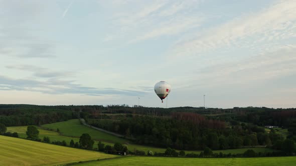Hot Air Balloon in the Sky Flying Over Green Fields on a Sunny Day Germany