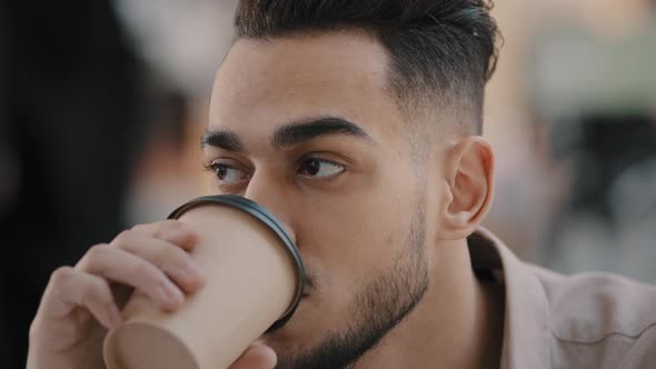 Closeup Portrait of Happy Young Bearded Arabian Guy Smiling Positive Man Drinking Coffee From Paper