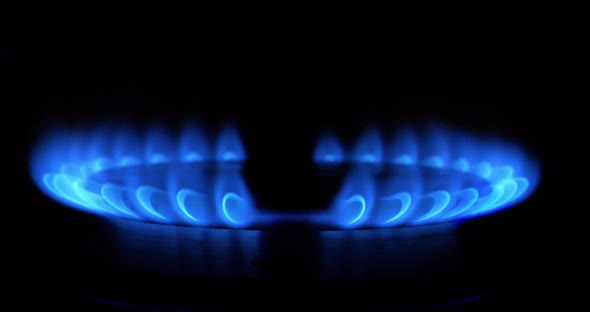 4K - Ignition of a blue flame on gas stove