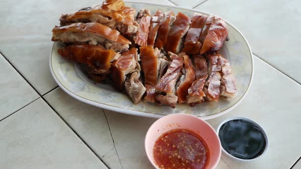 Asian Style Charcoal Grilled BBQ Pork, Crispy Brown Skin, Served With Black Sweet Soy Sauce And Spic