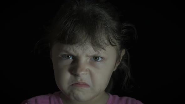 Portrait of an Angry Child. Single Angry Kid