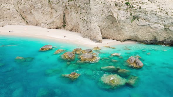Aerial view coastline with tall cliff and turquoise sea water, Lefkada.