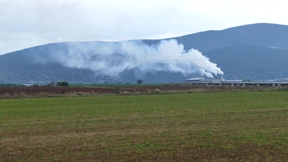 Smoke from factory in Elos Sourpis 