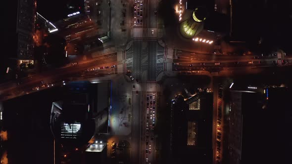 Aerial Birds Eye Overhead Top Down View of Traffic in Night City