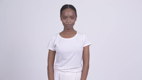 Young Beautiful African Woman Against White Background