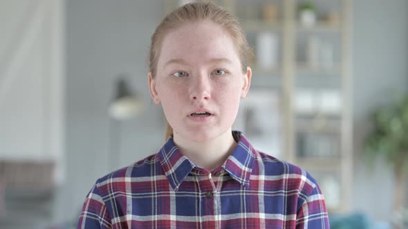 Close Up of Young Woman Ordering To Stop Talking