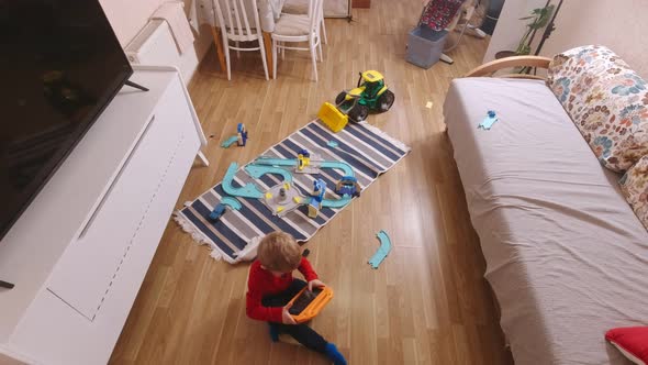 Boy With Tablet At Home Alone