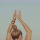 Blond Young Caucasian Girl Practicing Yoga on a Cliff in Front of the Sea or Ocean - VideoHive Item for Sale