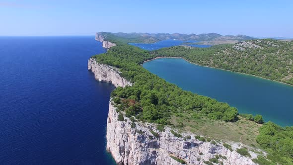 Panoramic view of cliffs and a beautiful salty lake on Dalmatian coast