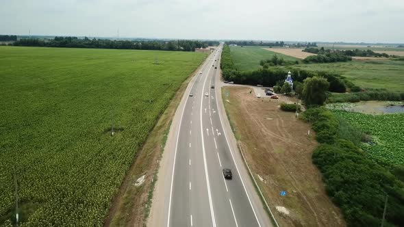 Aerial Fly Over Motorway, Freeway Traffic - Trucks and Cars on the Road