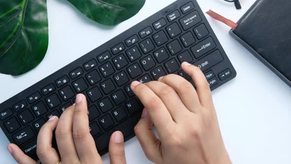  High Angle View of Women Hand Typing on Keyboard 