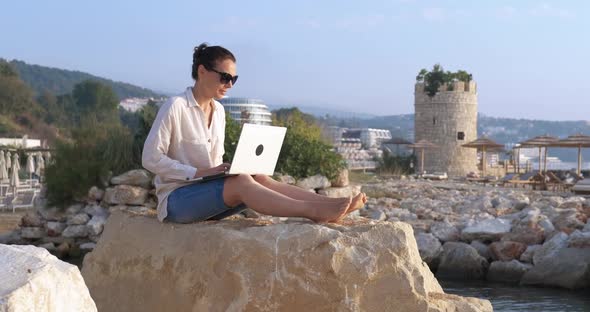 Working Businesswoman on Shore