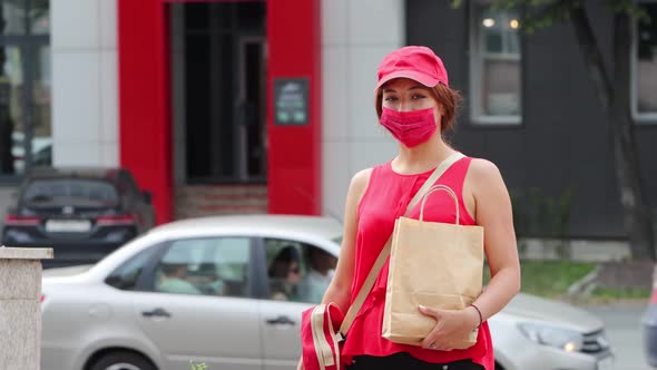 Portrait of a Courier Girl on the Street.