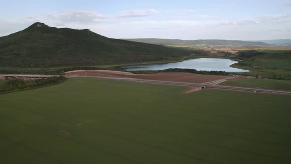 Drone flight over beautiful nature and a newly built highway