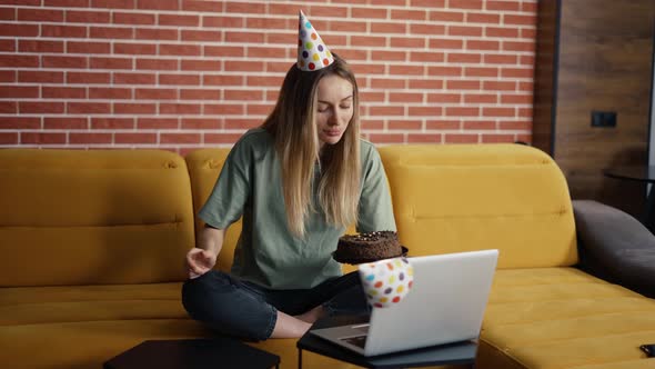 Woman Celebrating Distant Birthday Online with Friends Videochat