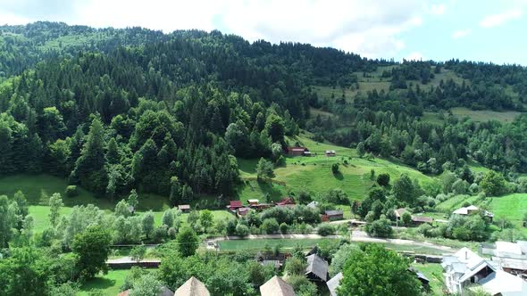 Flying Over Mountain Houses