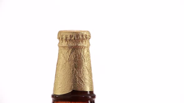 Opening Golden Beer Bottles