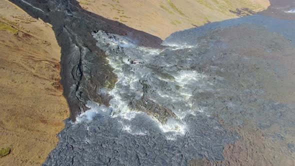 Aerial view of Natthagi valley filed with lava from erupting volcano, Iceland