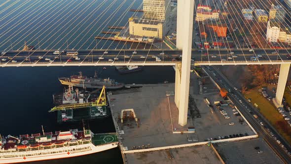 Drone View of the Impressive Cablestayed Golden Bridge at Sunrise