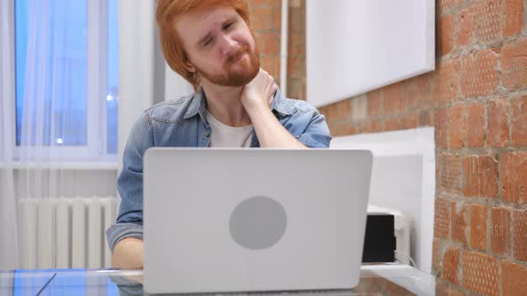 Tired Redhead Beard Man Working in Office