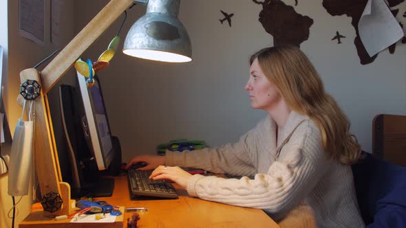 Woman Working At The Computer