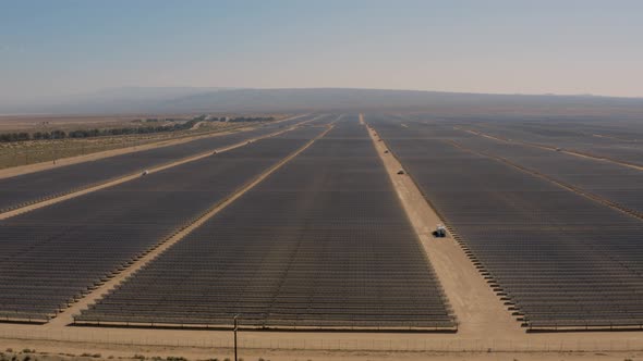 Endless rows of solar panels creating renewable energy in the Mojave Desert