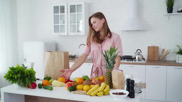 Young woman in the kitchen. 