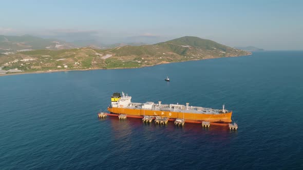 A gas tanker is anchored at sea aerial view 4 K