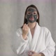 Young Woman Takes Care of Skin of Face - VideoHive Item for Sale