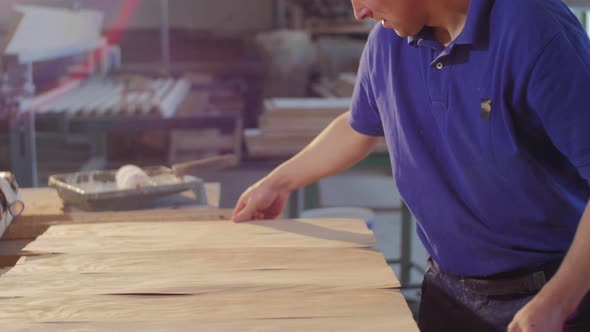 Applying paper-wood to wood board