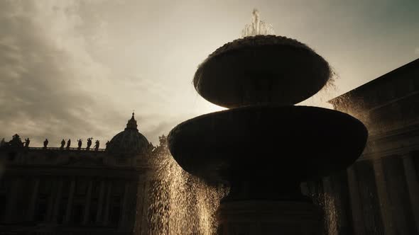 The Famous Fountain of San Pietro Italian Square with Saint Peter Church Columns, in Rome, Italy