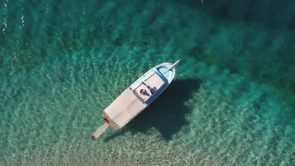 Beautiful Boat in the Clear Turquoise Sea