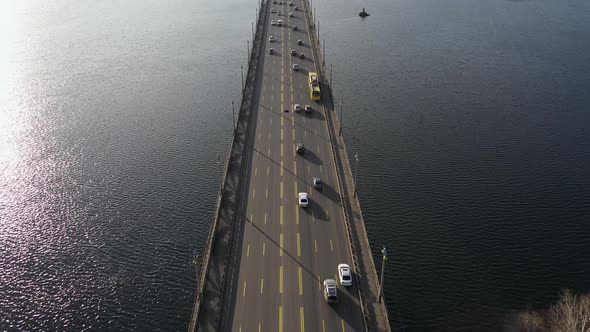 Urban Traffic on a Bridge Over a River.