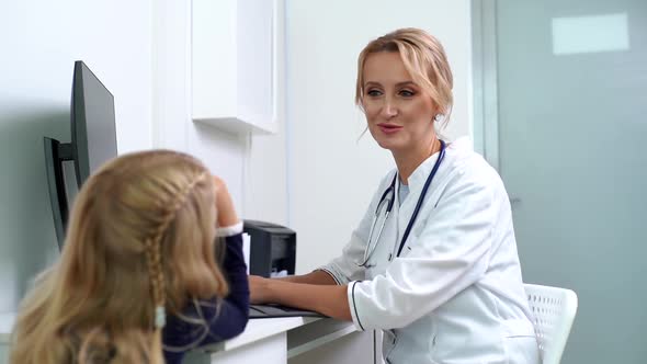 Pediatrician Finishes the Reception Amicably, Giving the Hand Gesture of Victory